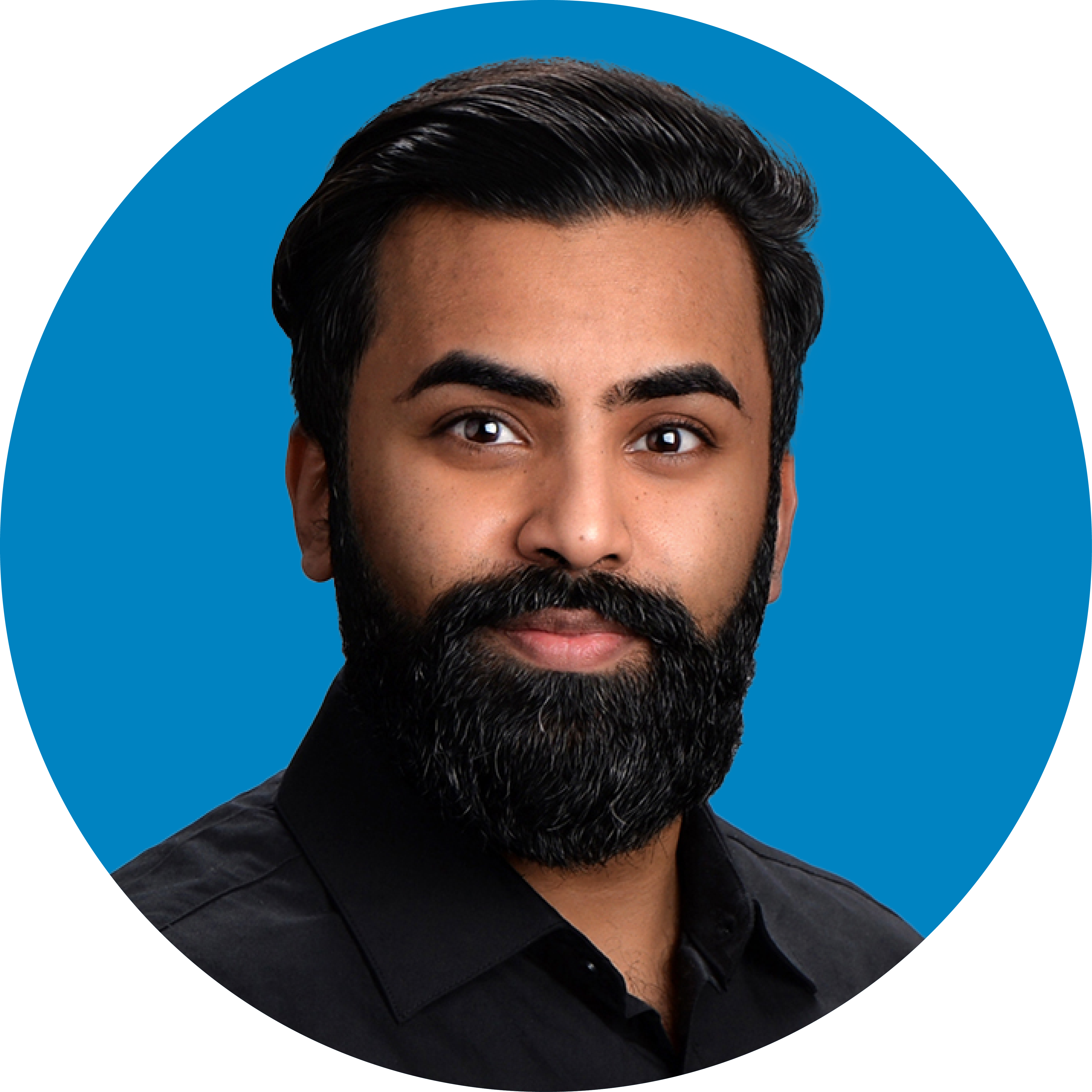 Mishal Makshood headshot blue background